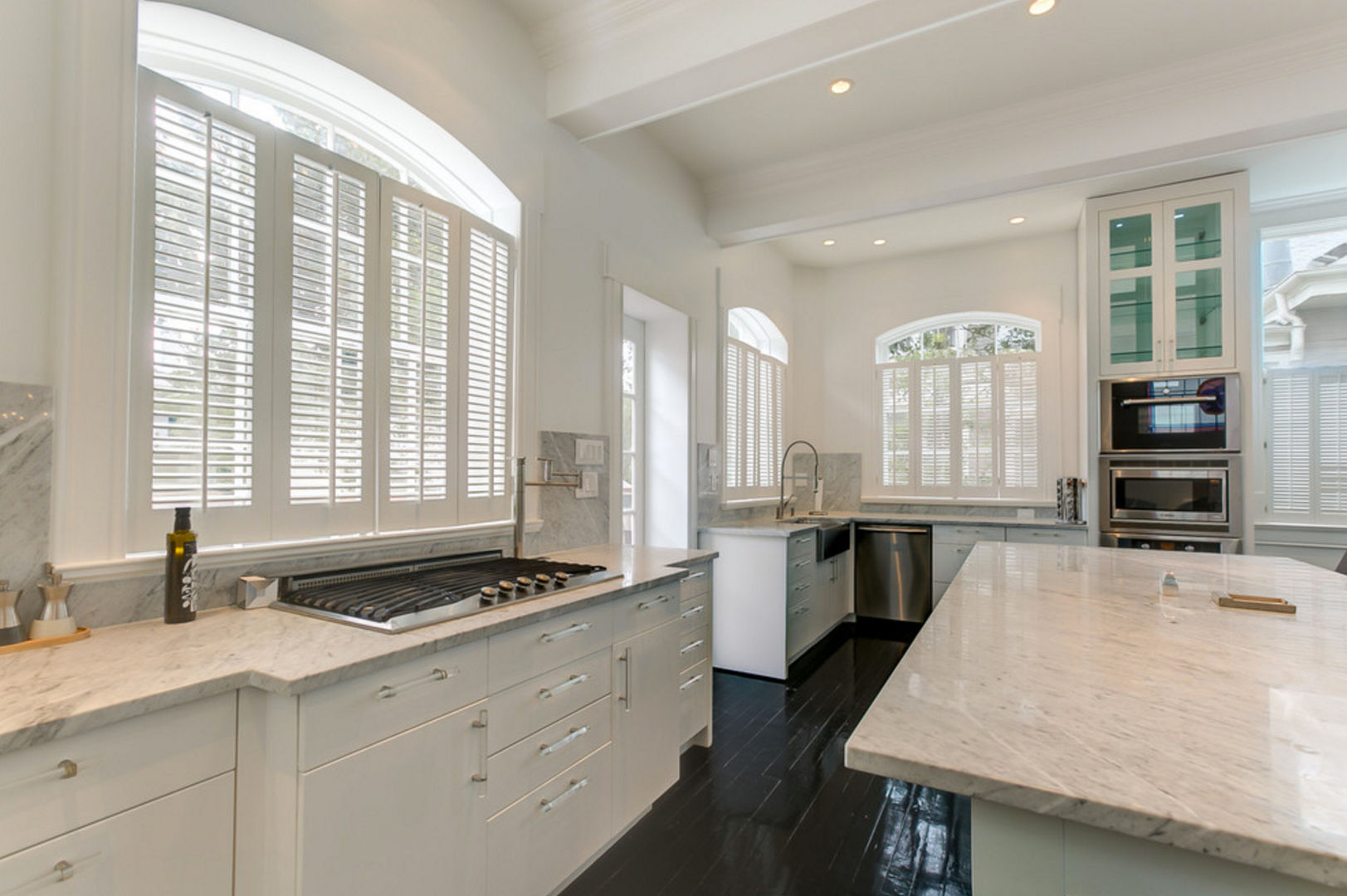 Nashville Avenue Residence, New Orleans studioWTA Kitchen kitchen,cabinetry,countertop,appliances,lacquered wood floor,studioWTA,Tracie Ashe,Natan Diacon-Furtado