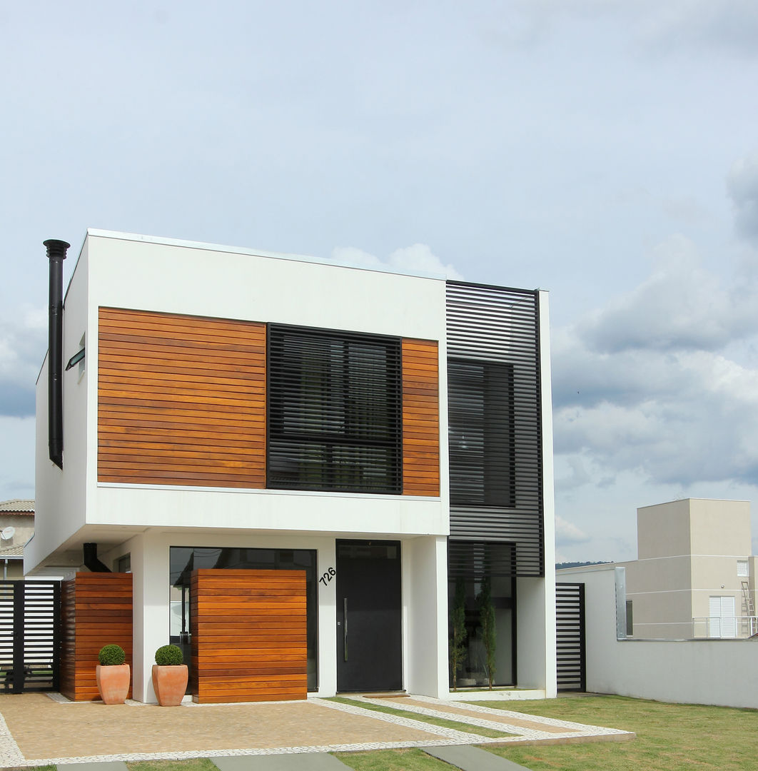 Casa AT, Taguá Arquitetura Taguá Arquitetura Modern houses لکڑی Wood effect