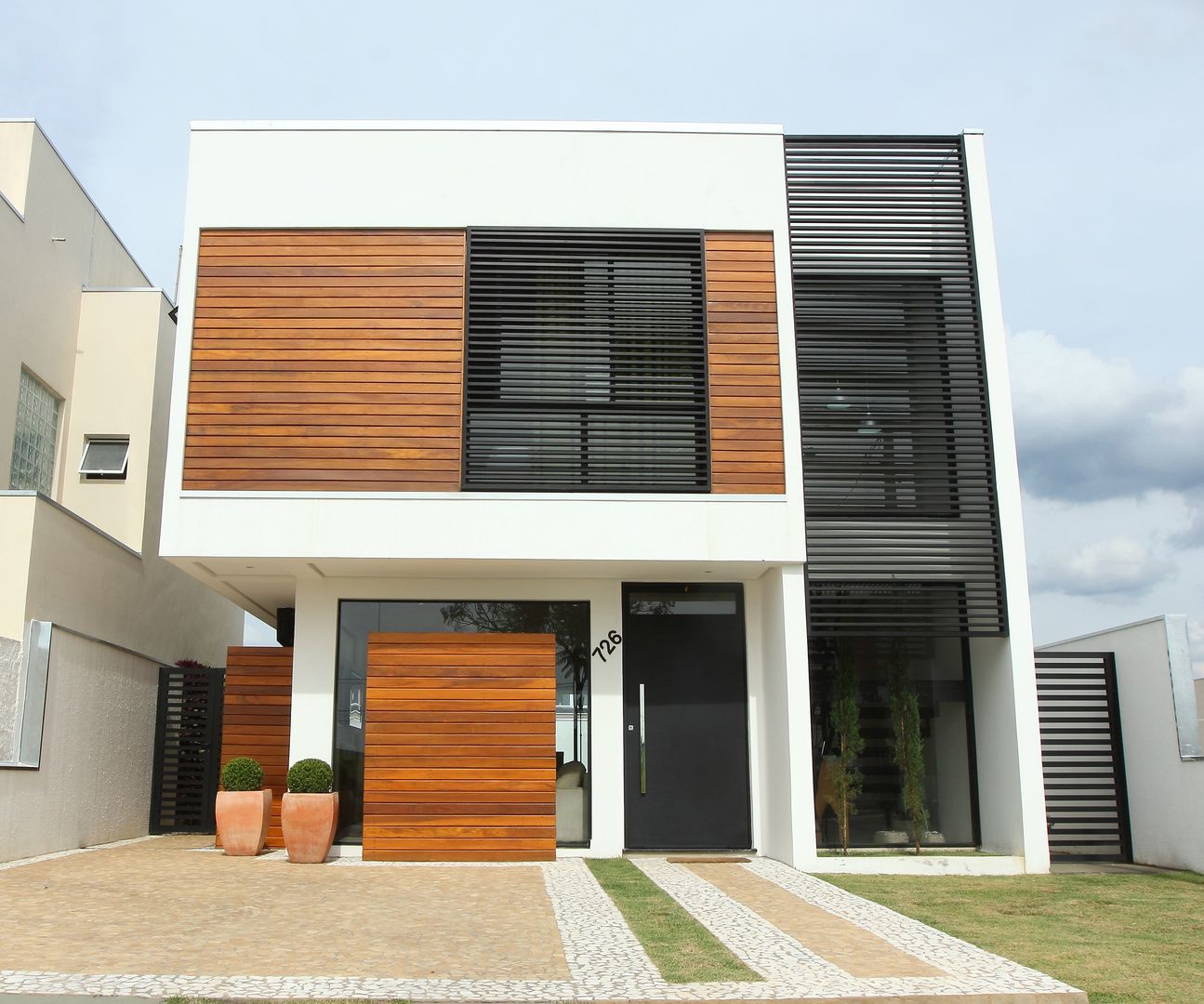 Residência AT - Itupeva SP Taguá Arquitetura Casas modernas Madeira Efeito de madeira