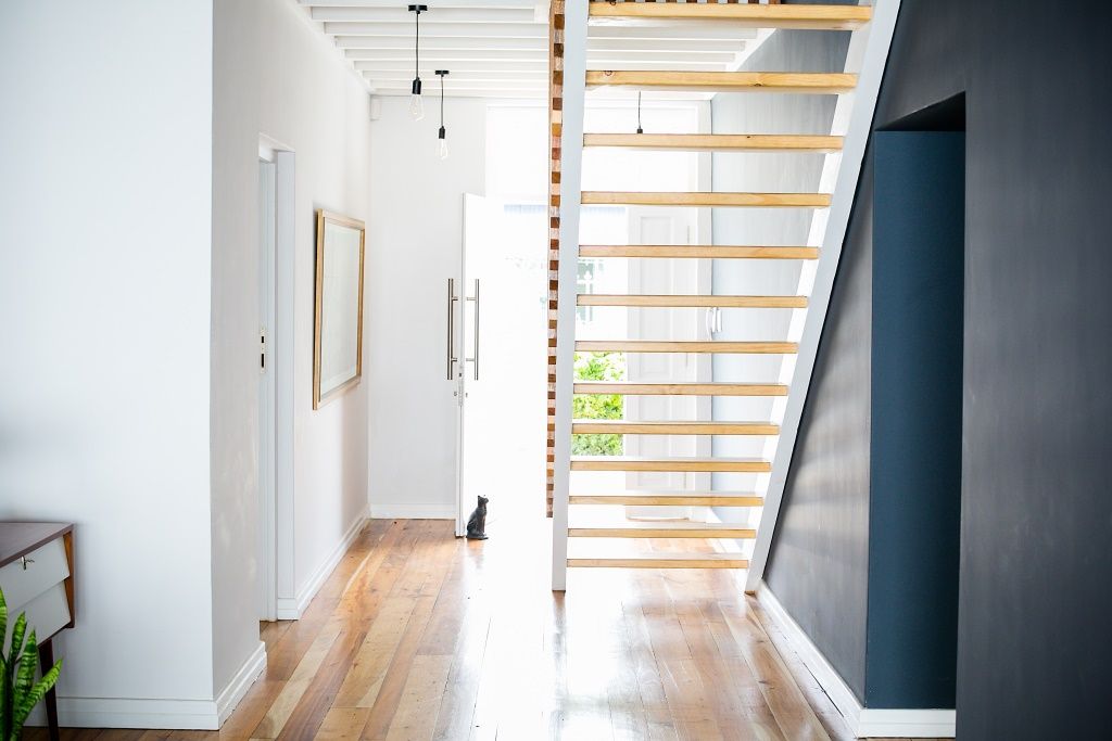 Mr and Mrs Super Chilled homify Scandinavian style corridor, hallway& stairs grey,wooden flooring,staircase,hanging pendant,scandi