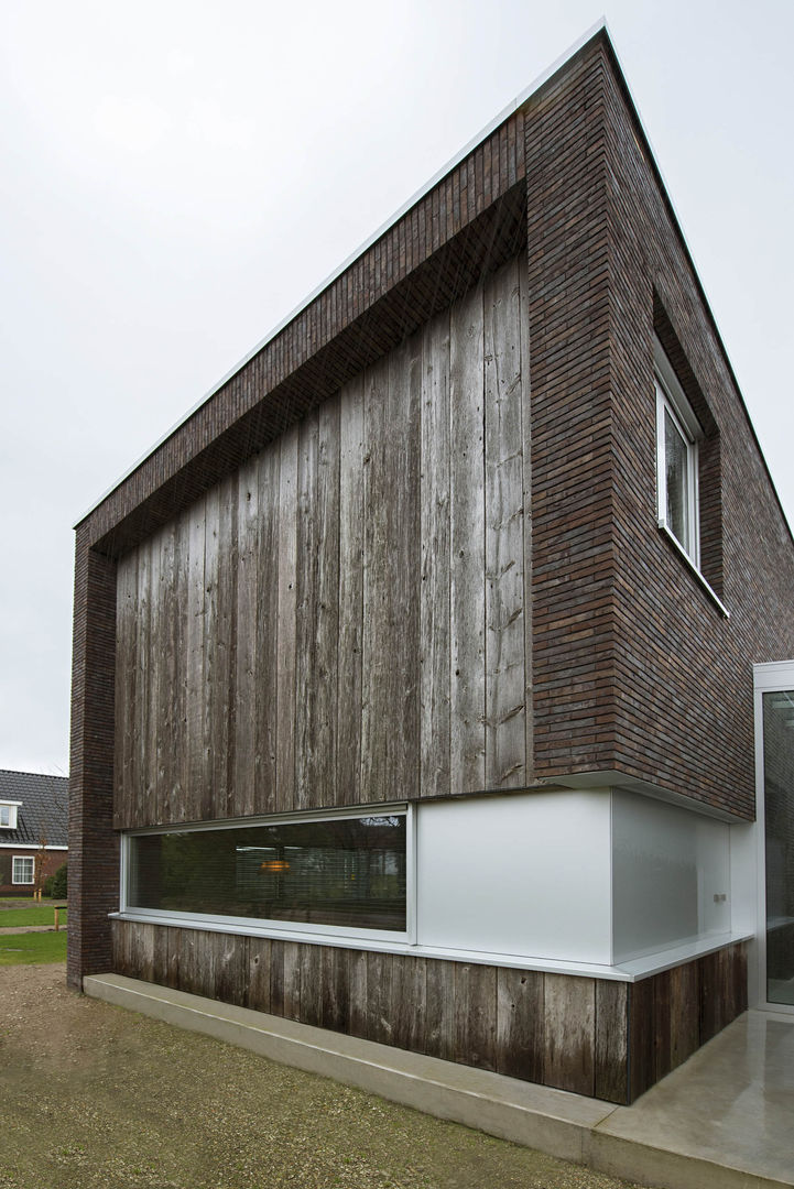 Landrover huis, Lab32 architecten Lab32 architecten Modern houses پتھر