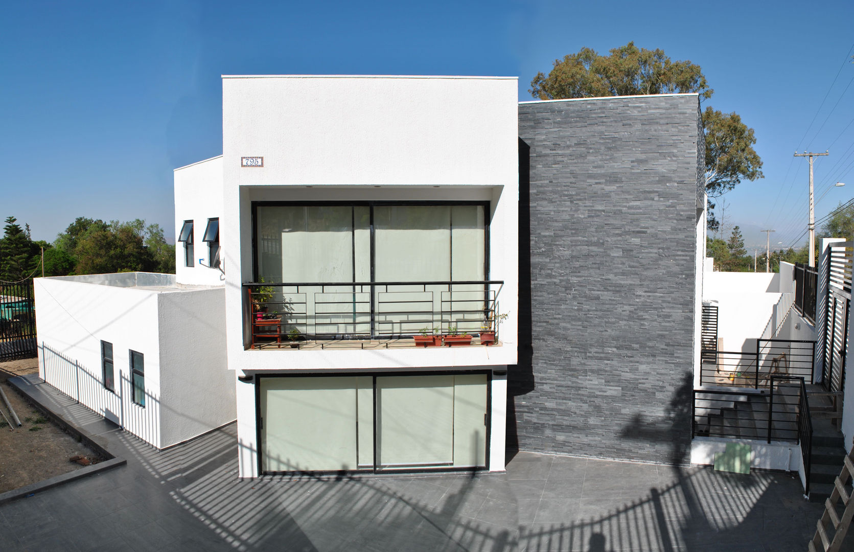 Casa Lomas, AtelierStudio AtelierStudio บ้านและที่อยู่อาศัย