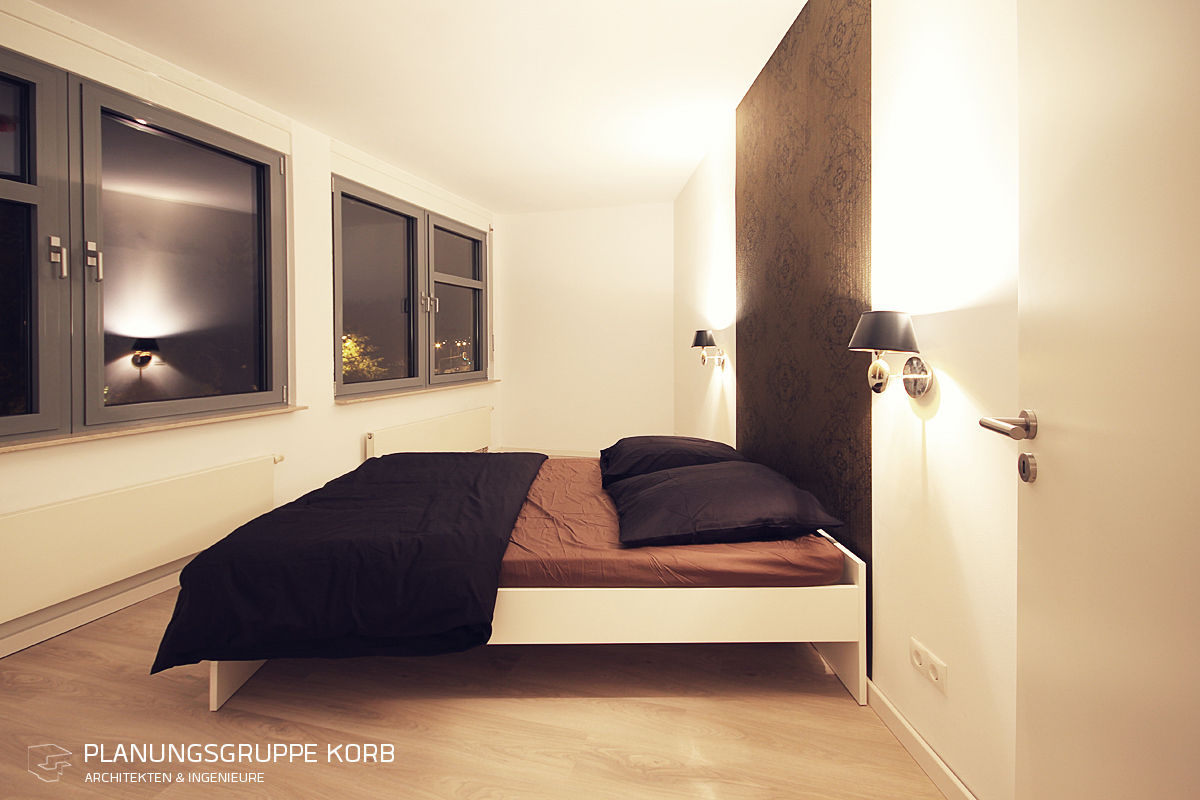 Wohnen am Südpark, Planungsgruppe Korb GmbH Architekten & Ingenieure Planungsgruppe Korb GmbH Architekten & Ingenieure Modern style bedroom