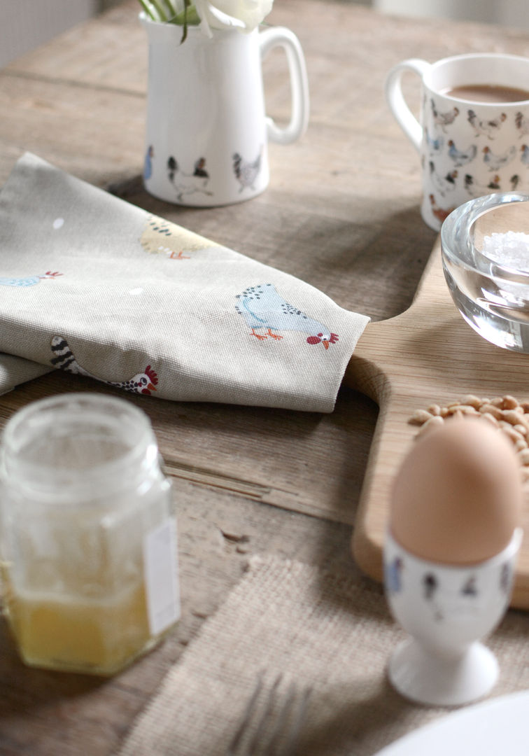 Sophie Allport's 'Lay a little egg' collection Sophie Allport Kitchen سرامک chicken,hen,spring,easter,egg cup,table,kitchen,dining,napkin,tableware,Cutlery, crockery & glassware