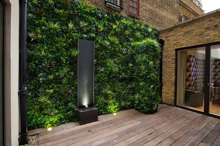 Artificial Greenery Wall For Indoor & Outdoor Landscape, Sunwing Industries Ltd Sunwing Industries Ltd モダンデザインの テラス プラスティック 植物＆花