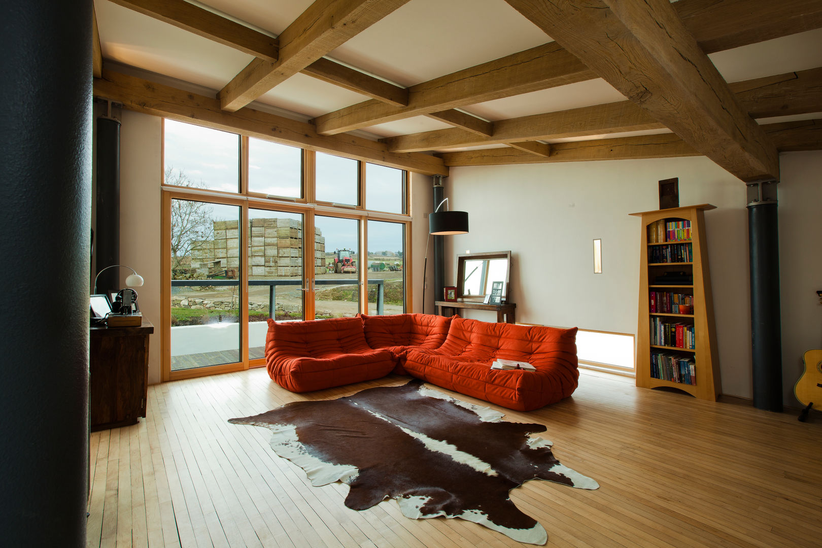 Barn Loft Living in an Agricultural Landscape Retool architecture Living room Glass Passive solar Barn l
