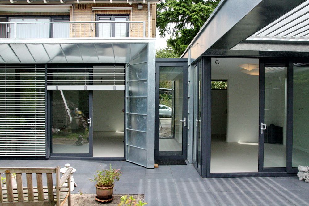 Moderne Uitbouw en aanbouw, Architectenbureau Jules Zwijsen Architectenbureau Jules Zwijsen บ้านและที่อยู่อาศัย