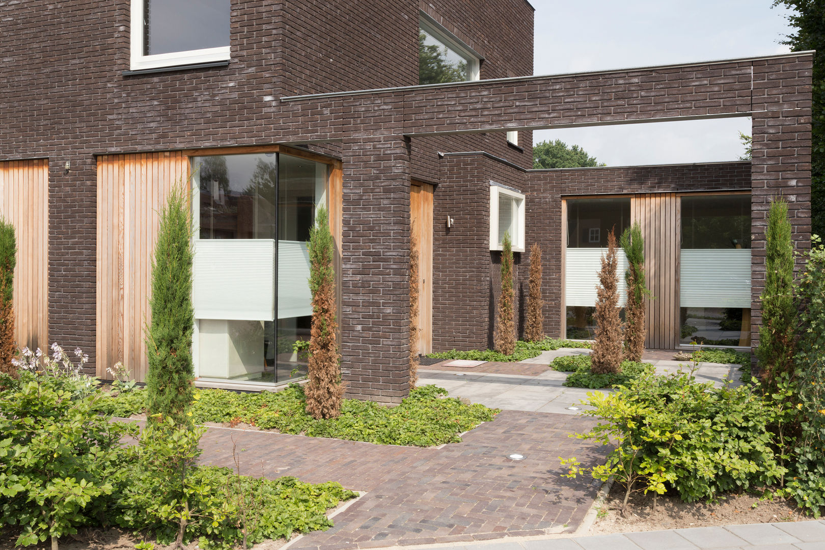 patio voorzijde Jan Couwenberg Architectuur Moderne tuinen