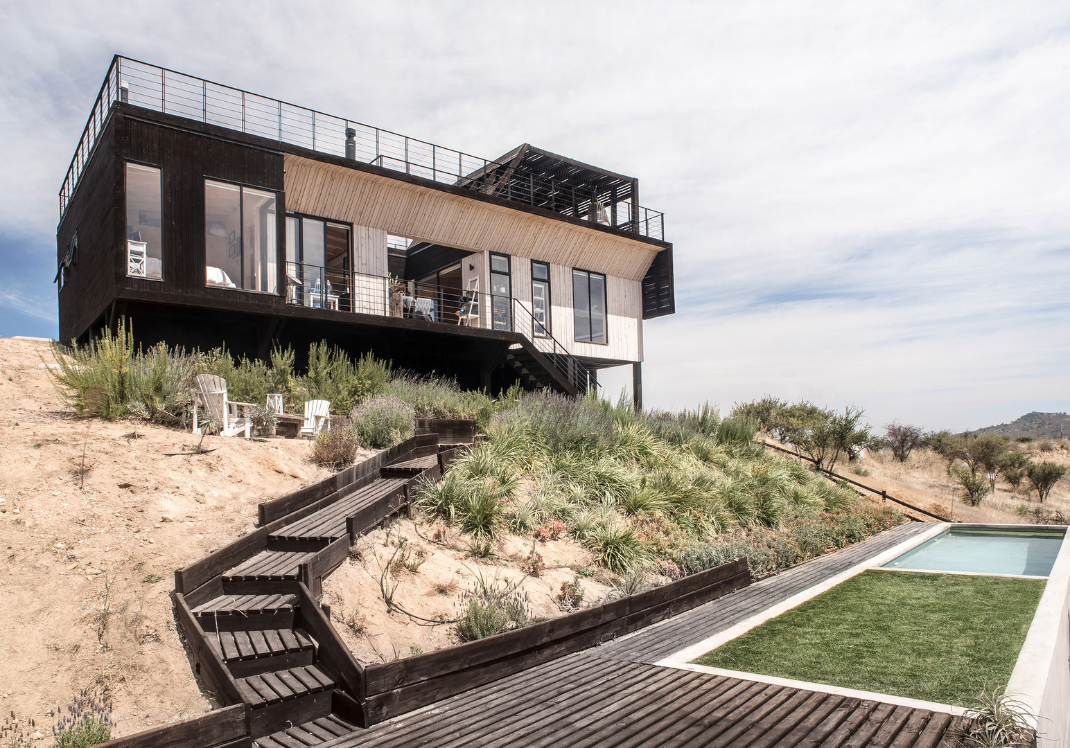 The Folding House, B+V Arquitectos B+V Arquitectos Nowoczesny ogród Drewno O efekcie drewna