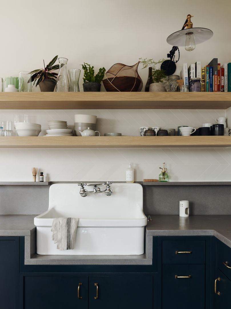 Kitchen with Concrete countertops and white oak shelving homify Кухня concrete,oak