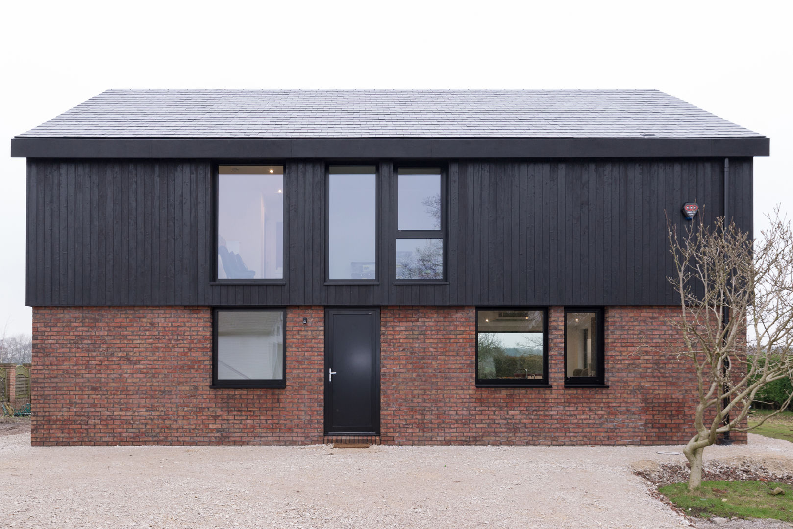 Entrance view guy taylor associates Modern houses Wood Wood effect