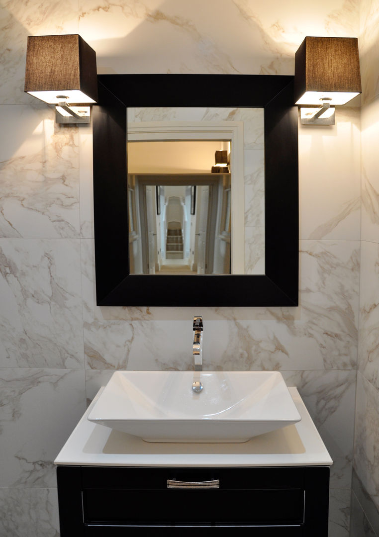 Apartment Renovation homify Modern Banyo Mermer cloak room design,marble bathroom