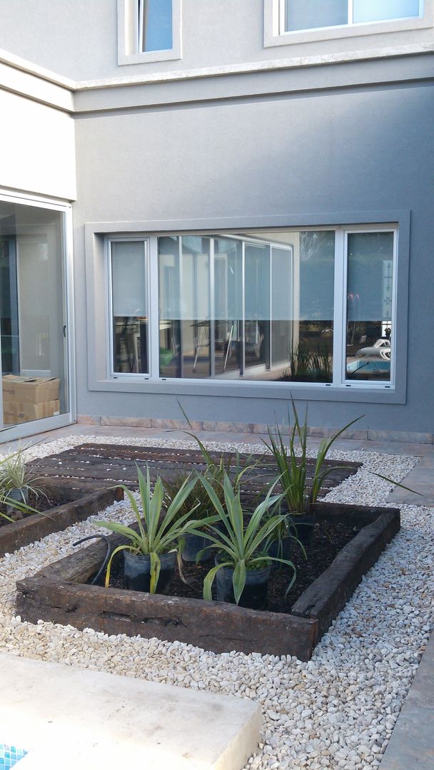 Casa en Barrio Cerrado, Grupo PZ Grupo PZ Casas modernas