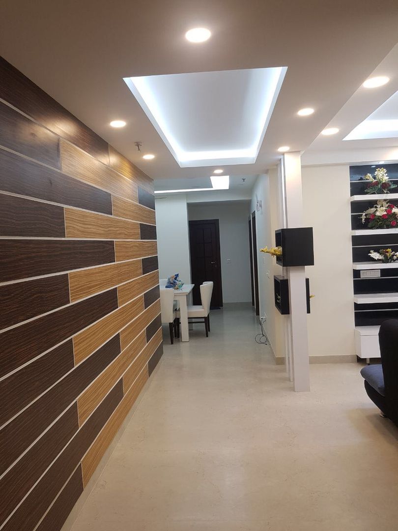 Jain's residency, Fabros Interiors Fabros Interiors Modern corridor, hallway & stairs Lighting