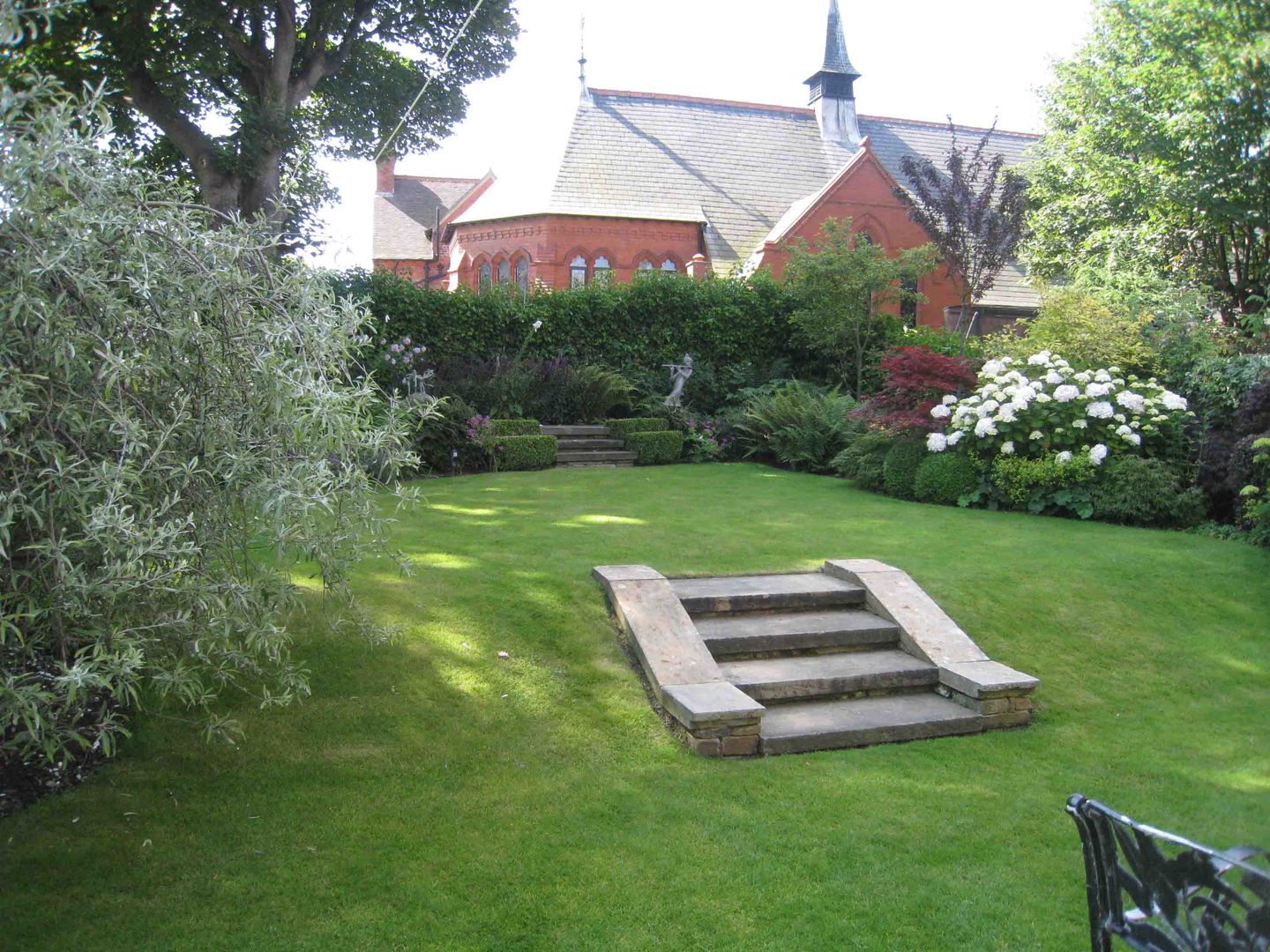 West Kirby Garden After - Sloping Grass Banks - Caroline Benedict Smith Garden Design Cheshire Caroline Benedict Smith Garden Design Cheshire