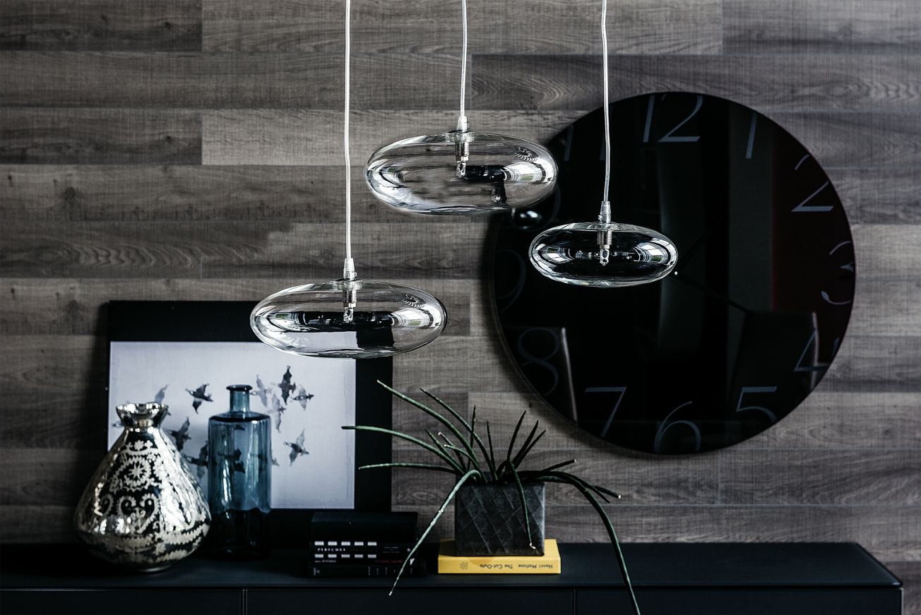 A stunning elliptical orb available in two sizes with various combinations. IQ Furniture Modern living room Lighting