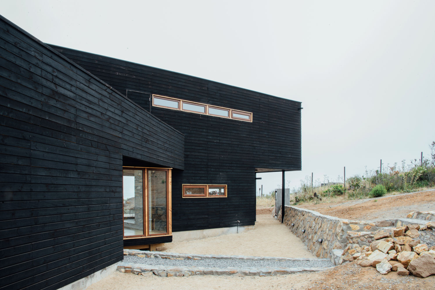 Casa en Los Molles, Thomas Löwenstein arquitecto Thomas Löwenstein arquitecto Case in stile rustico Legno Effetto legno