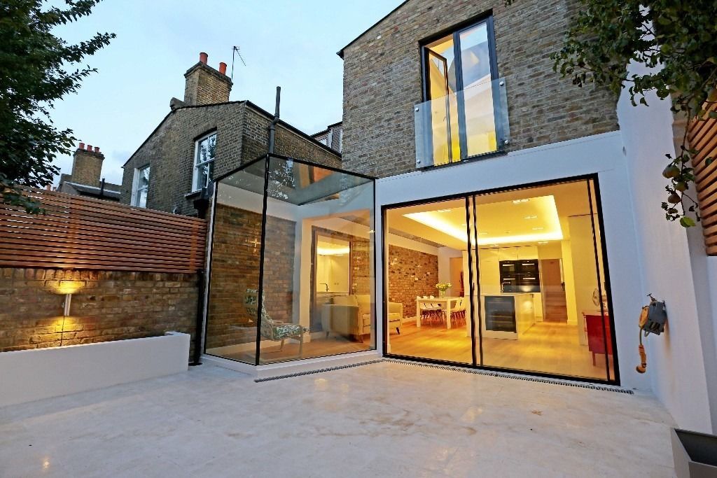 House renovation and House Extension in Fulham SW6 APT Renovation Ltd Casas modernas