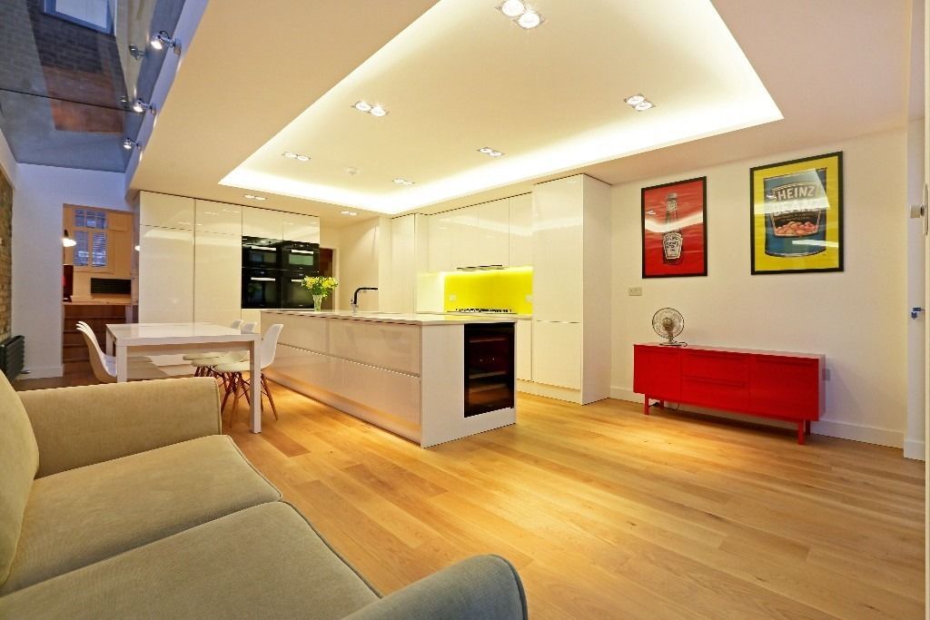 House renovation and House Extension in Fulham SW6 APT Renovation Ltd モダンデザインの ダイニング