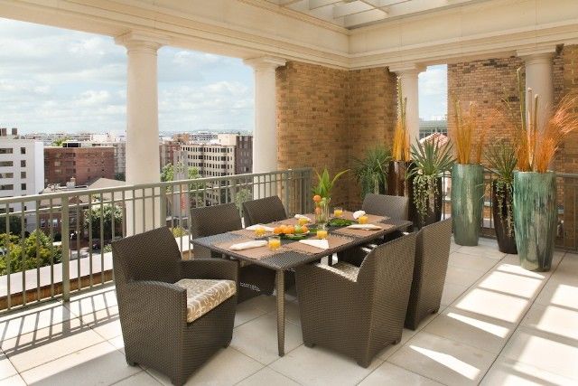 Penthouse Posh - Terrace Dining Lorna Gross Interior Design Modern Terrace outdoor dining,contemporary,custom,rattan,outdoor seating,orange,columns,penthouse,high end