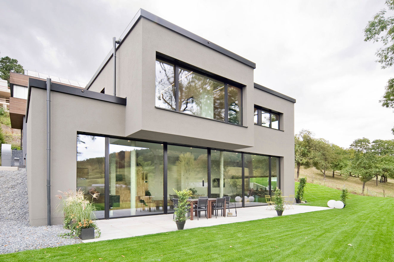 Ökologisches Traumhaus aus Beton und Massivholz, Maisons Loginter Maisons Loginter Casas de estilo moderno