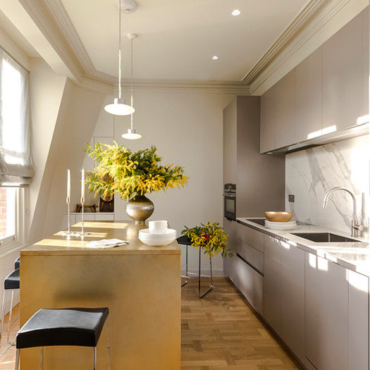 View of kitchen area including island Studio 29 Architects ltd مطبخ فلز Espresso kitchens,brass kitchen,built-in kitchen,brass island,kitchen island,breakfast bar