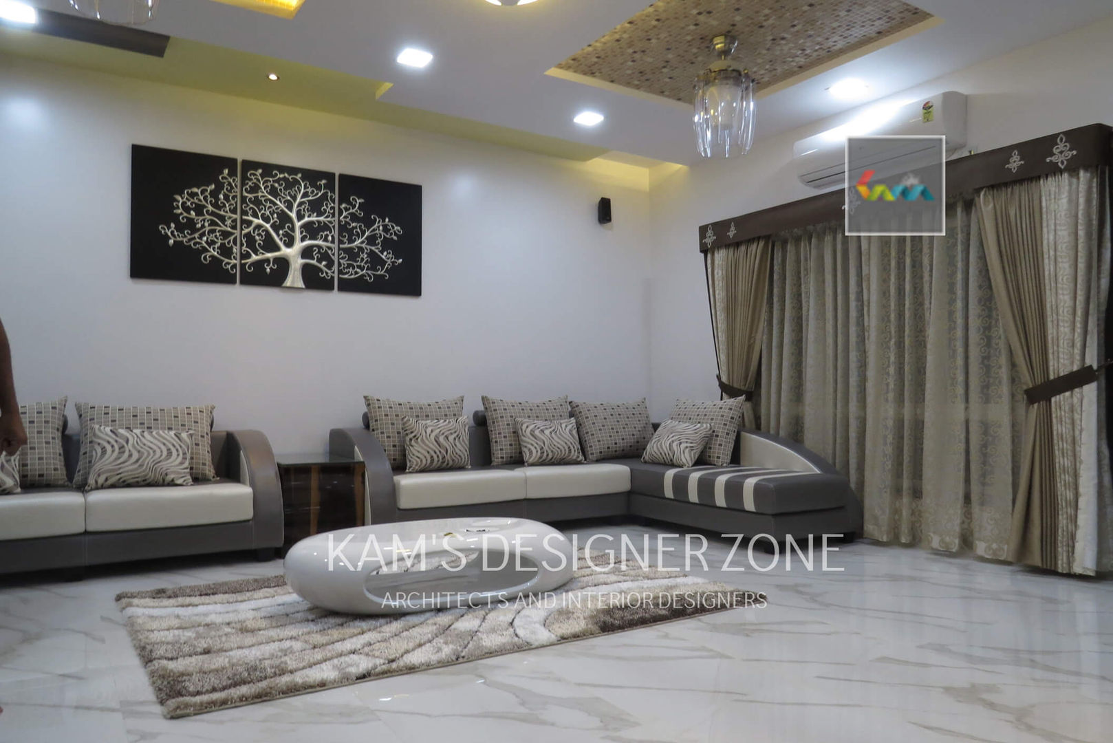 Home interior design for Mr. Aji John, KAMS DESIGNER ZONE KAMS DESIGNER ZONE غرفة المعيشة