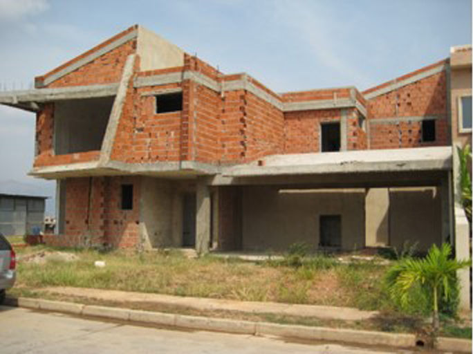 Vista Frontal sur/este. Vivienda V12. Obra gris. EISEN Arquitectura + Construccion Casas de estilo escandinavo Concreto Proyecto,Arquitectura,Diseño,Vivienda,Valencia,Caracas,Venezuela,Eisen Guerrero,Architecture,Construcción,Construction,Obra gris