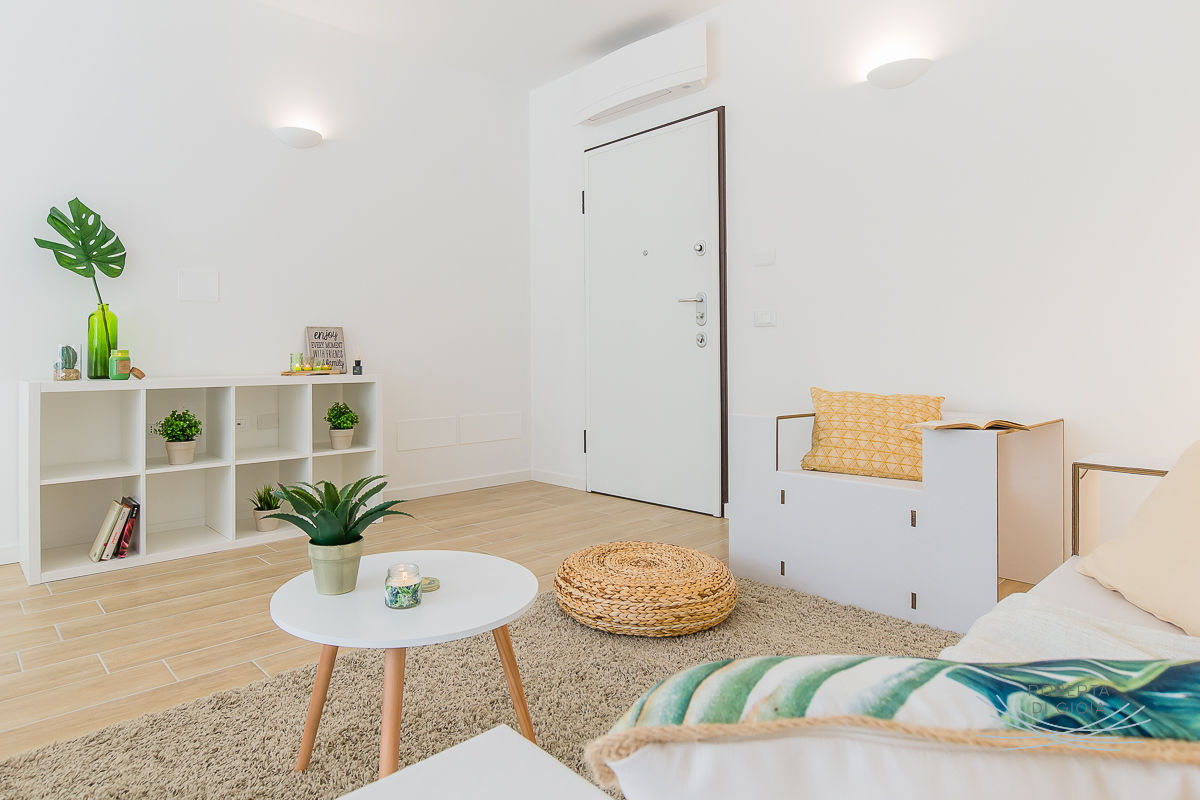 Appartamento campione in cantiere di Rho (MI), Home Staging & Dintorni Home Staging & Dintorni Phòng khách phong cách Bắc Âu