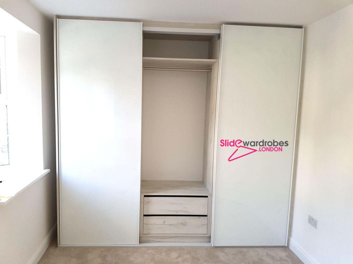 Custom made wardrobe with 3 sliding doors. Opened door view Slide Wardrobes London Chambre moderne Verre Penderies et commodes