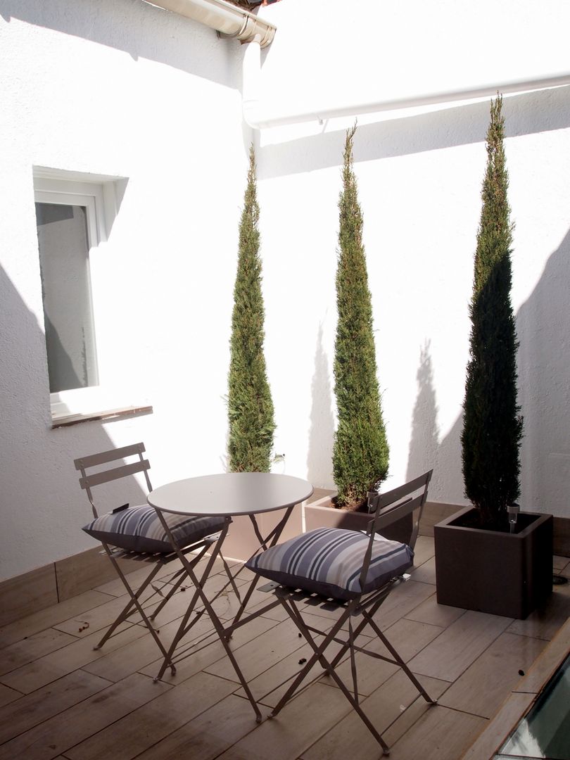 Reforma integral de vivienda unifamiliar en Madrid, Reformmia Reformmia Modern garden