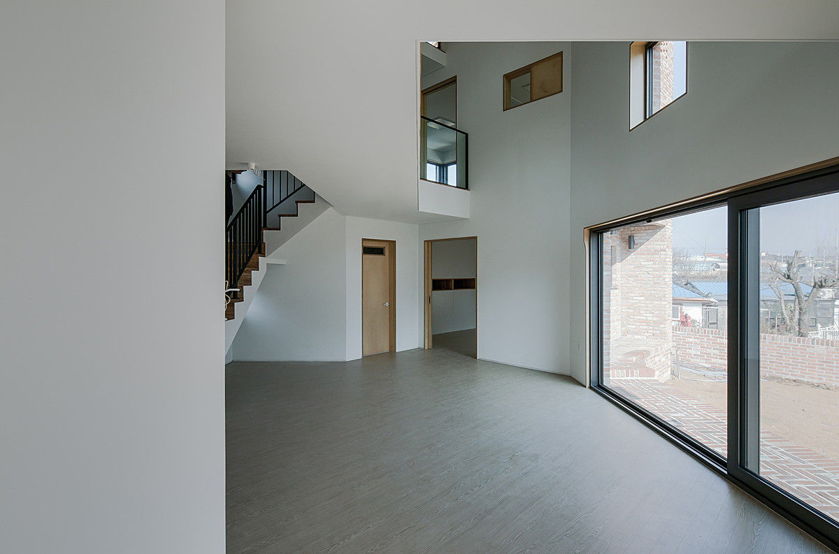 양산주택- 고래의꿈 , (주)건축사사무소 코비 (주)건축사사무소 코비 Moderne Wohnzimmer