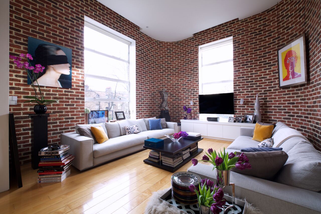 London Loft, JKG Interiors JKG Interiors Industrial style living room Bricks