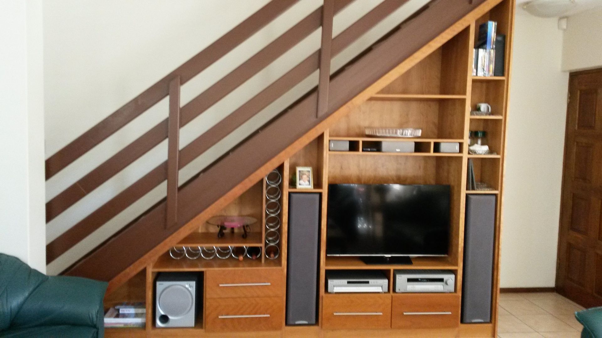 Tv wall deals unit under staircase