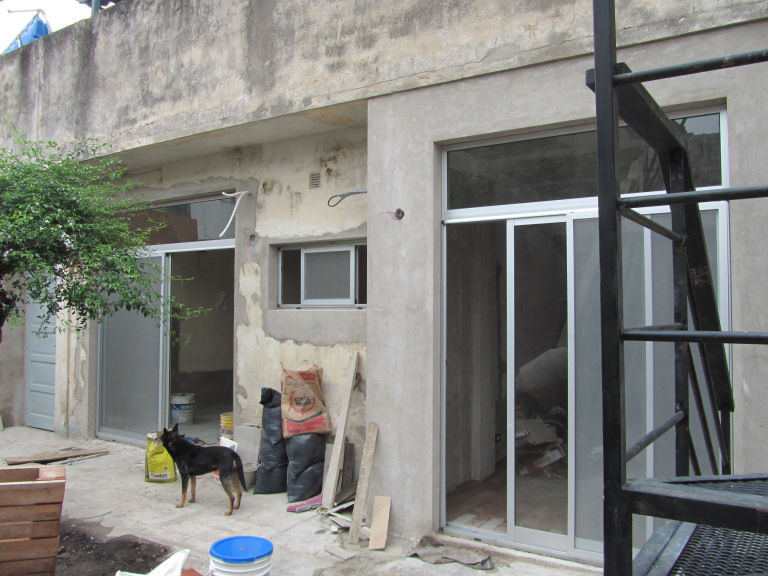 REMODELACION Y AMPLIACION CASA EN AVELLANEDA, ARQUITECTA MORIELLO ARQUITECTA MORIELLO Modern houses