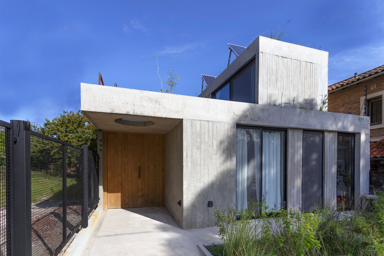 Casa MeMo - VIVIENDA UNIFAMILIAR ICONO DE LA SUSTENTABILIDAD , BAM! arquitectura BAM! arquitectura Rumah Modern Beton