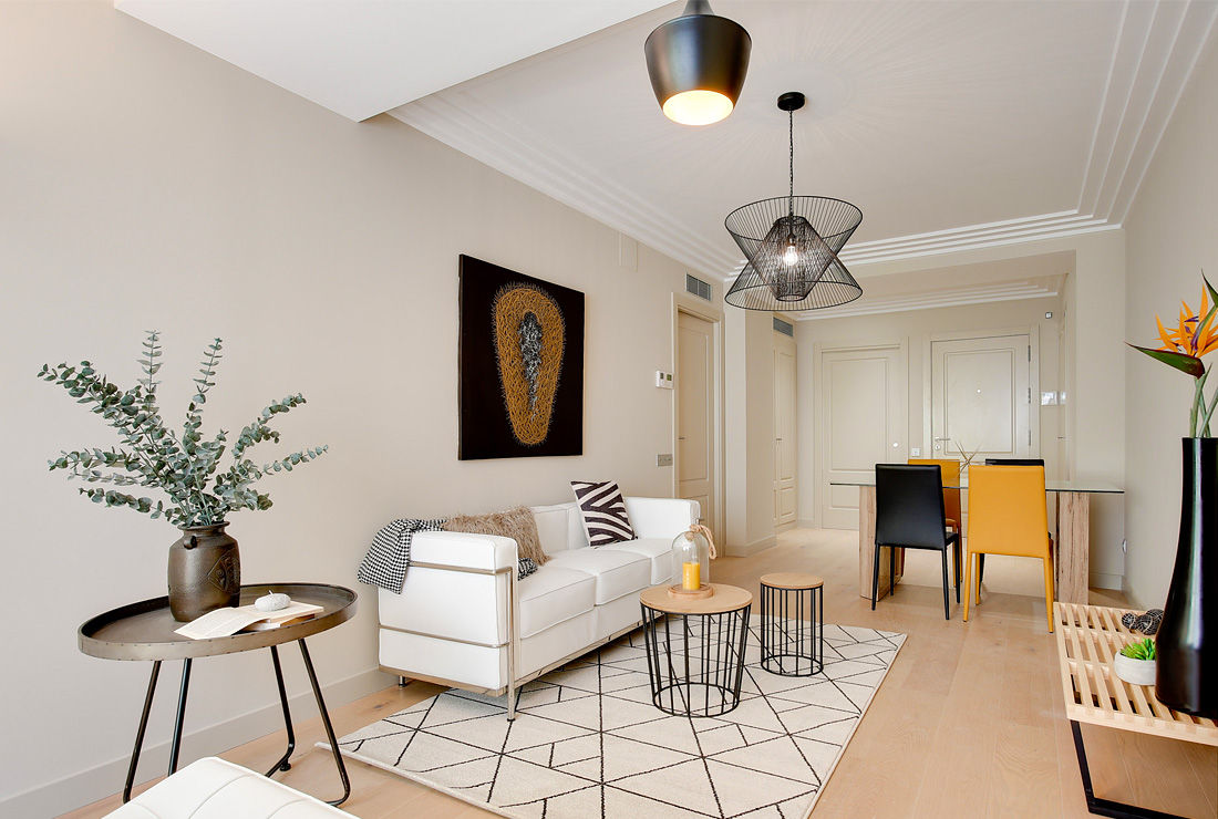 Living area Markham Stagers Modern living room white leather sofa,Le Corbusier,rug,geometry,modern apartment,golden accents,black accents,minimal,urban decor,artwork