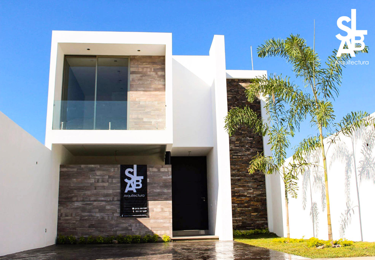 Fachada Slab Arquitectos Casas modernas