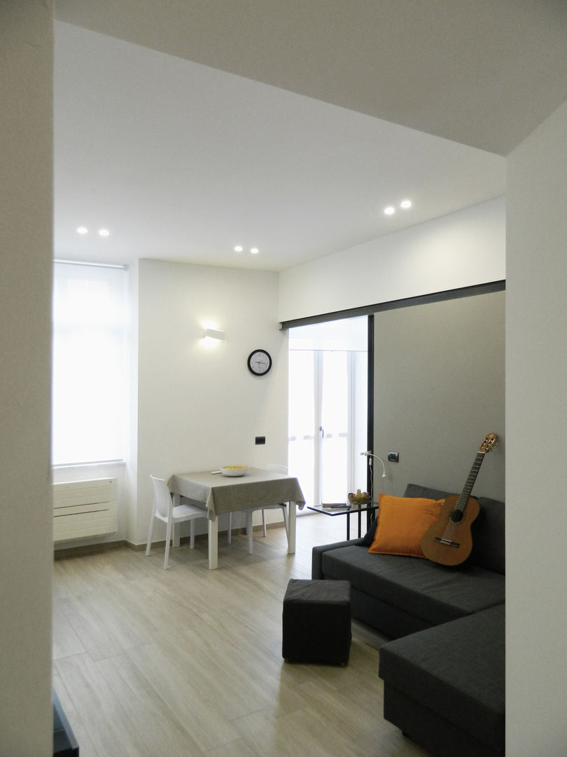 Ingresso_02 M2Bstudio Soggiorno moderno soggiorno,living,light,luce,led,zigzag,appartamento,apartment,acciaio