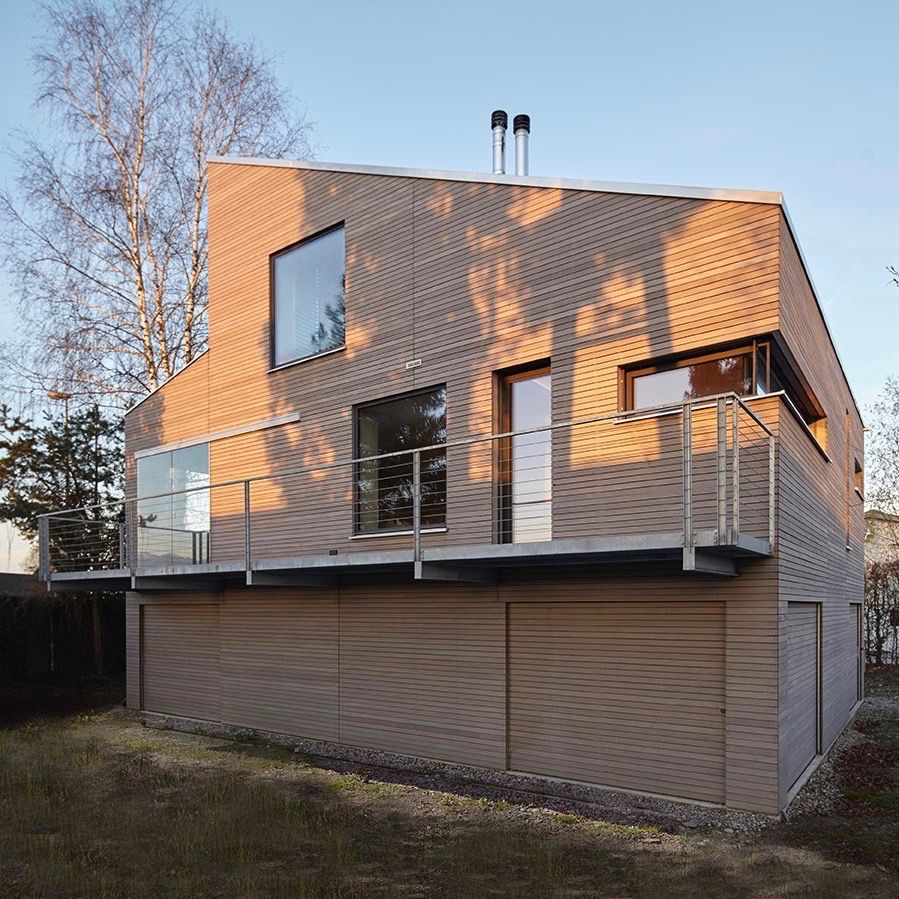 Ein Ferienhaus am Bodensee konzipiert von den Architeckten Geckeler, ARCHITEKTEN GECKELER ARCHITEKTEN GECKELER Дома в стиле модерн Дерево Эффект древесины