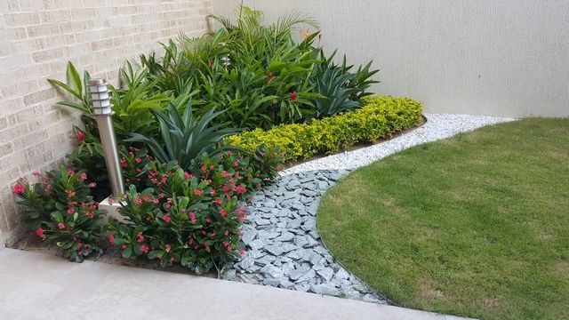 CONJUNTO ANCARES CAMPESTRE - BARRANQUILLA - COLOMBIA, BRASSICA SOLUCIONES PAISAJISTICAS S.A.S. BRASSICA SOLUCIONES PAISAJISTICAS S.A.S. Vườn phong cách nhiệt đới