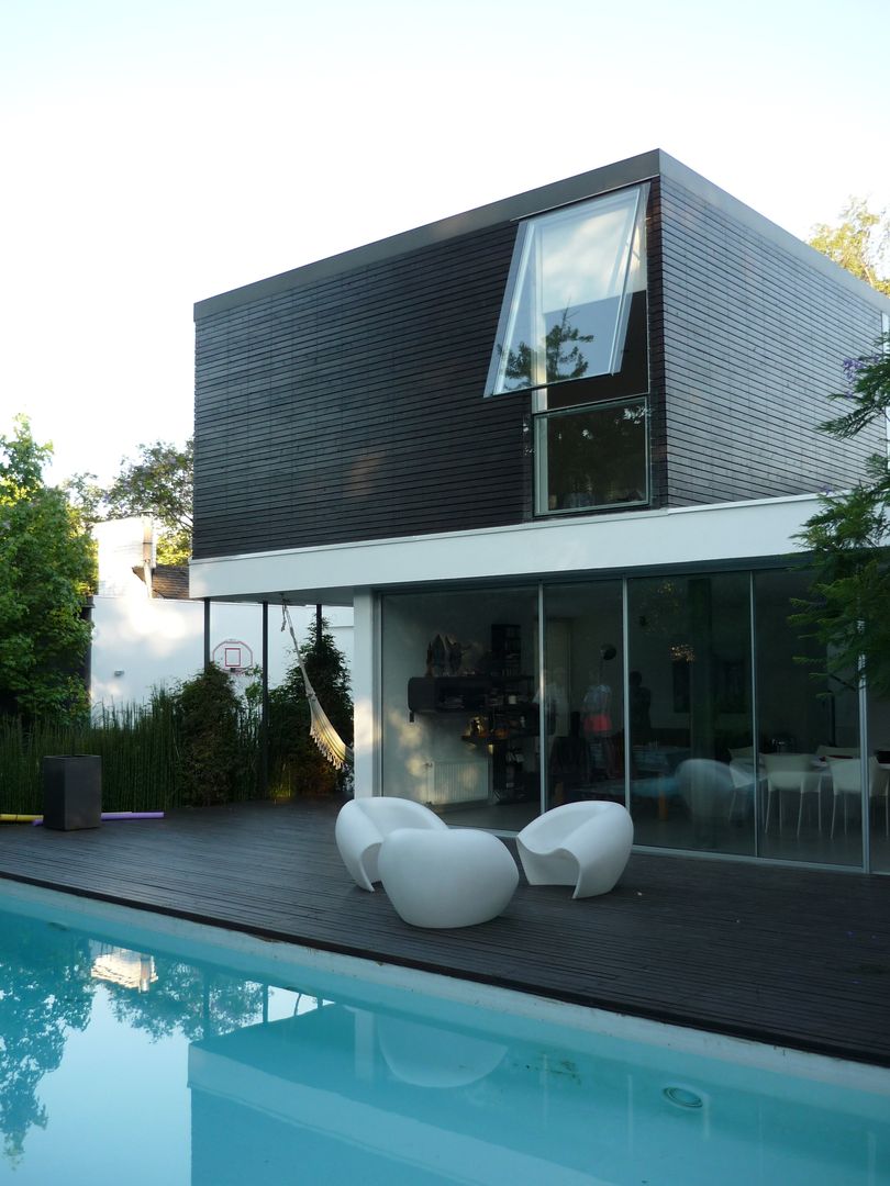 Casa Joullié, Claudia Tidy Arquitectura Claudia Tidy Arquitectura 미니멀리스트 주택 우드 우드 그레인