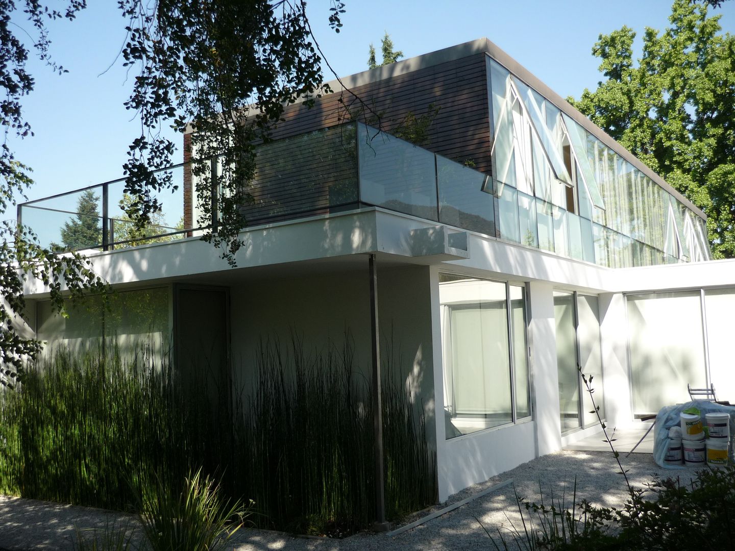 Casa Joullié, Claudia Tidy Arquitectura Claudia Tidy Arquitectura Minimalistische balkons, veranda's en terrassen Hout Hout