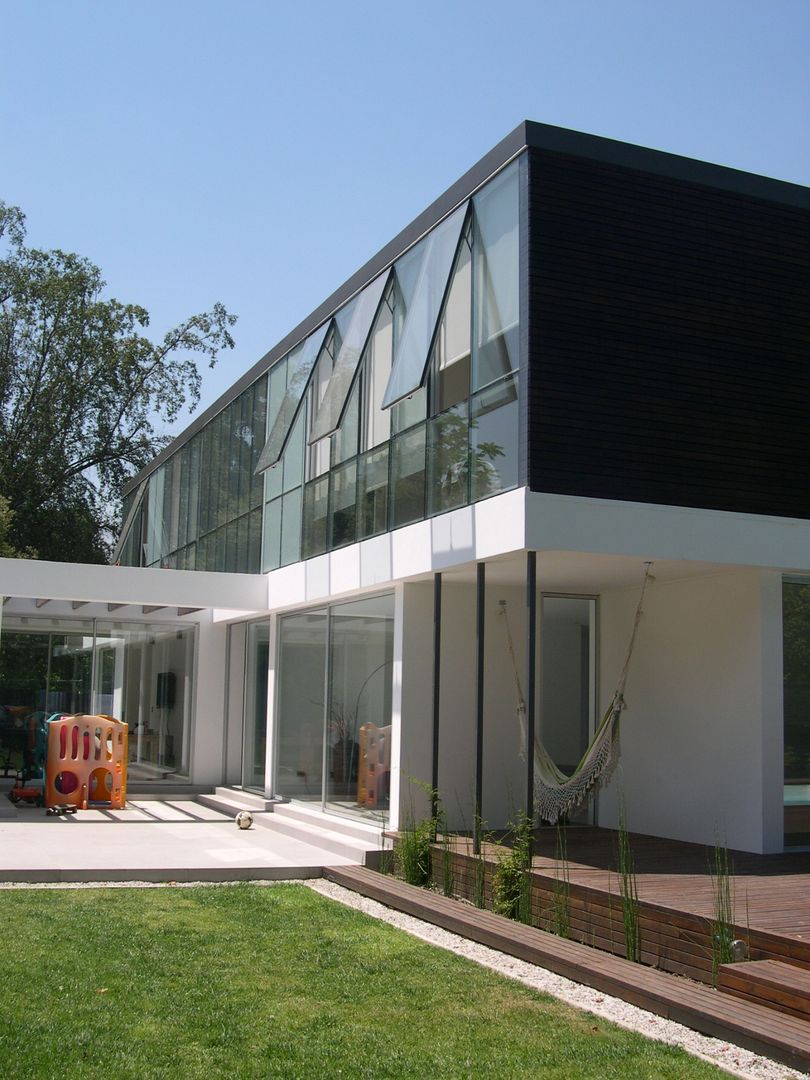 Casa Joullié, Claudia Tidy Arquitectura Claudia Tidy Arquitectura 미니멀리스트 주택 우드 우드 그레인