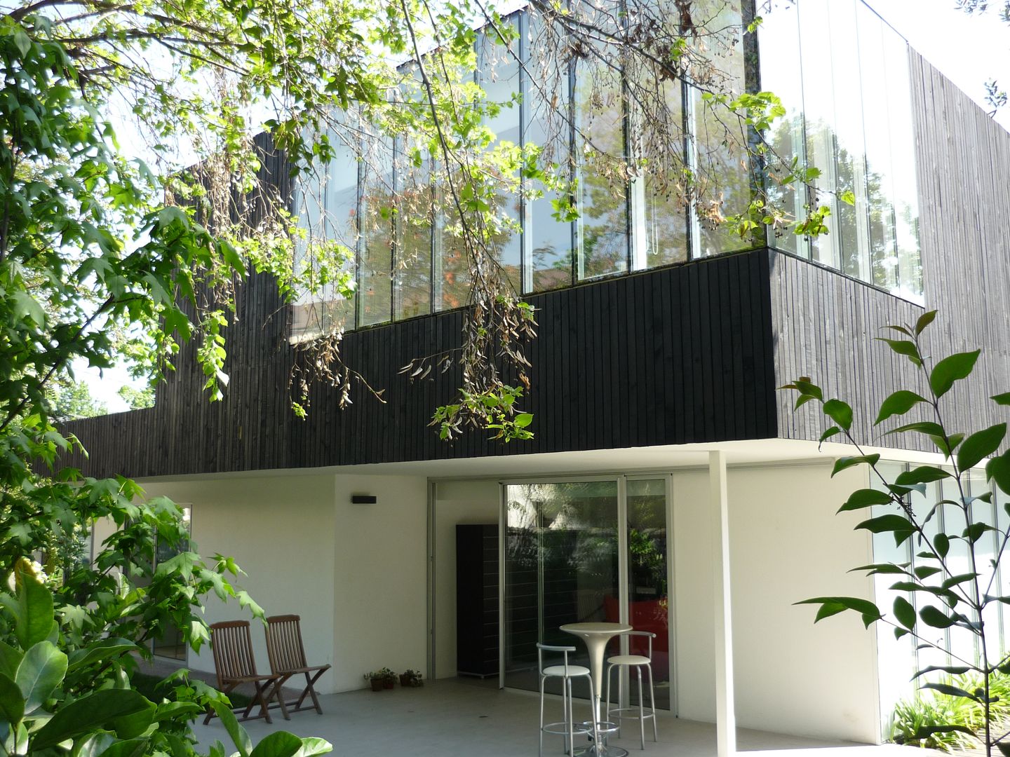 Casa Infanti Claudia Tidy Arquitectura Casas de estilo minimalista Madera Acabado en madera