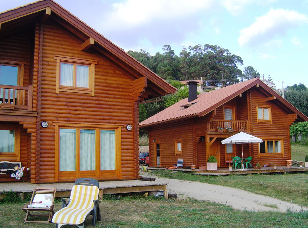 RUSTICASA | 100 projetos | Portugal + Espanha, RUSTICASA RUSTICASA Wooden houses Solid Wood Multicolored