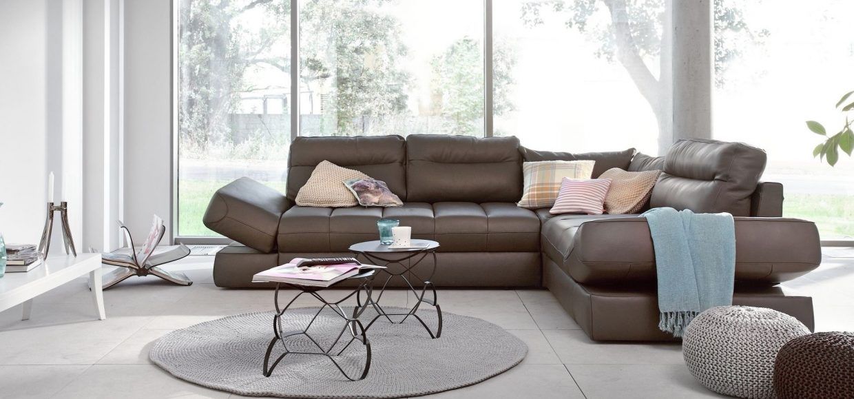 Un Loft Acogedor, Ikonik Home Ikonik Home Living room چرمی Grey Sofas & armchairs