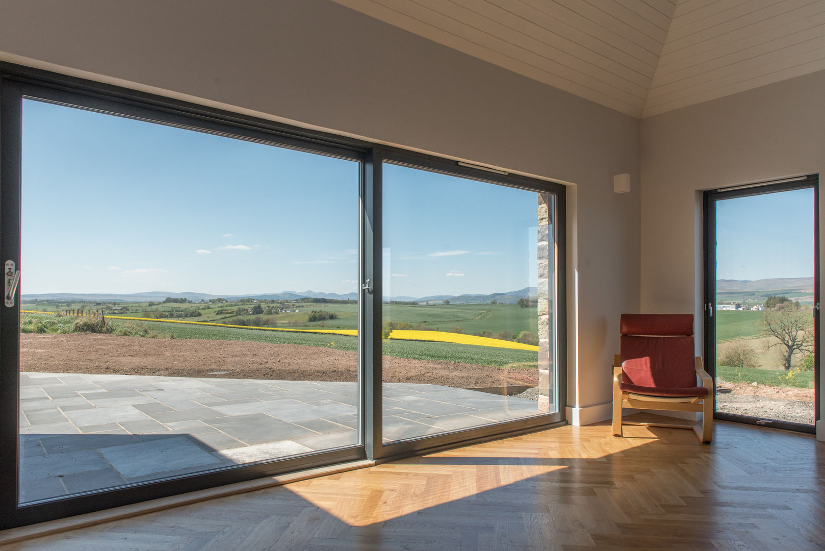 Drumpark Plot 1, Woodside Parker Kirk Architects Woodside Parker Kirk Architects Living room sliding door,TImber floor,Parquet,Living room,Room with a view