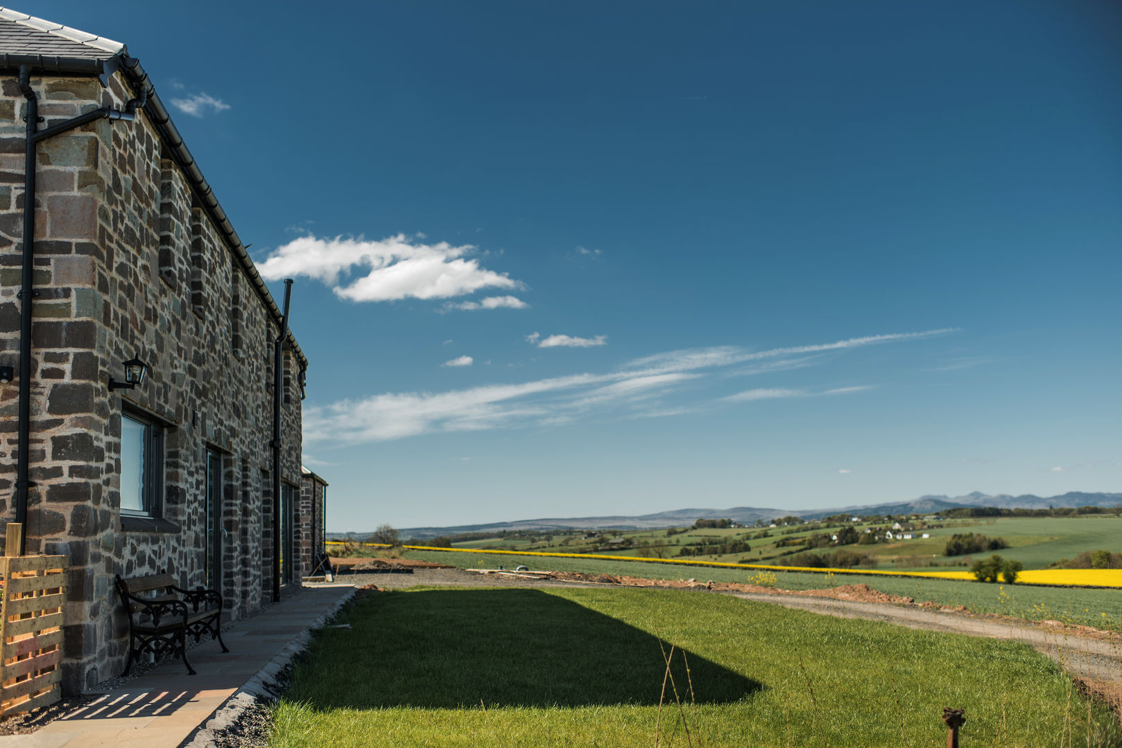 Fantastic views over the landscape Woodside Parker Kirk Architects Country style garden Stone Garden,lawn,rural,design,landscape,farm steading