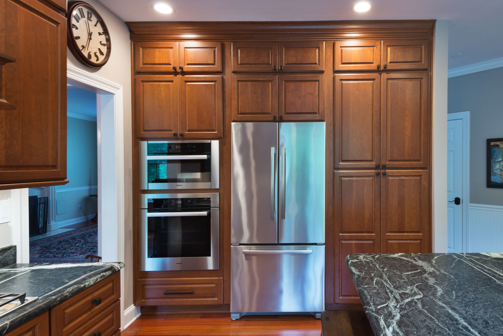 Bishop Medium Cherry Raised Panel Kitchen Main Line Kitchen Design Kitchen wall ovens,french door,refrigerator